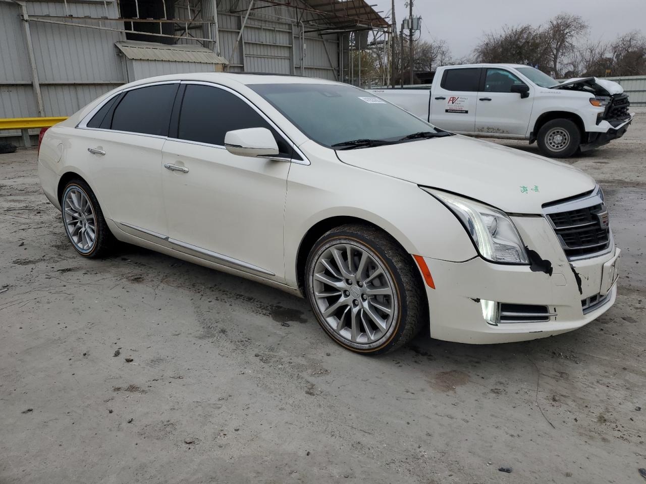 2013 Cadillac XTS VIN 2G61P5S33D9119292 Copart auction photo, front end / minor dent/scratches damage thumbnail 4