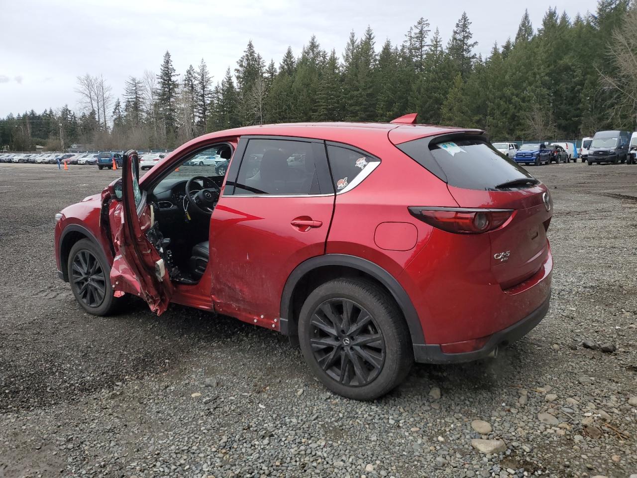 2021 Mazda CX-5 VIN JM3KFBDM2M1403811 Copart auction photo, side / front end damage thumbnail 2