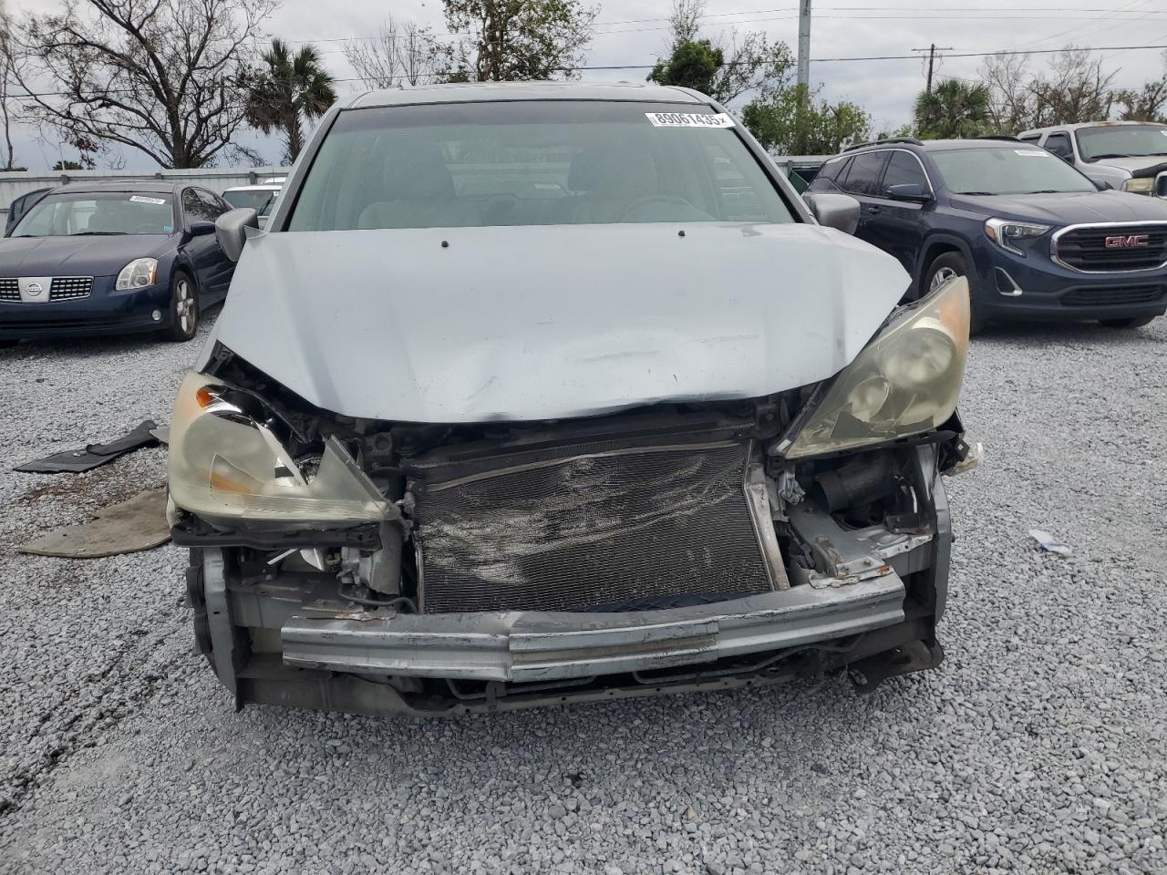 2009 Honda Odyssey VIN 5FNRL38619B051143 Copart auction photo, front end / side damage thumbnail 5
