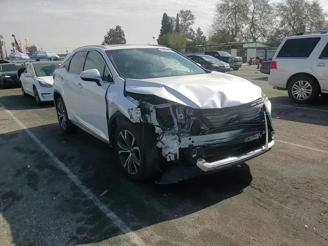 2019 Lexus RX VIN 2T2BGMCA7KC030486 Copart auction photo, front end / minor dent/scratches damage thumbnail 11