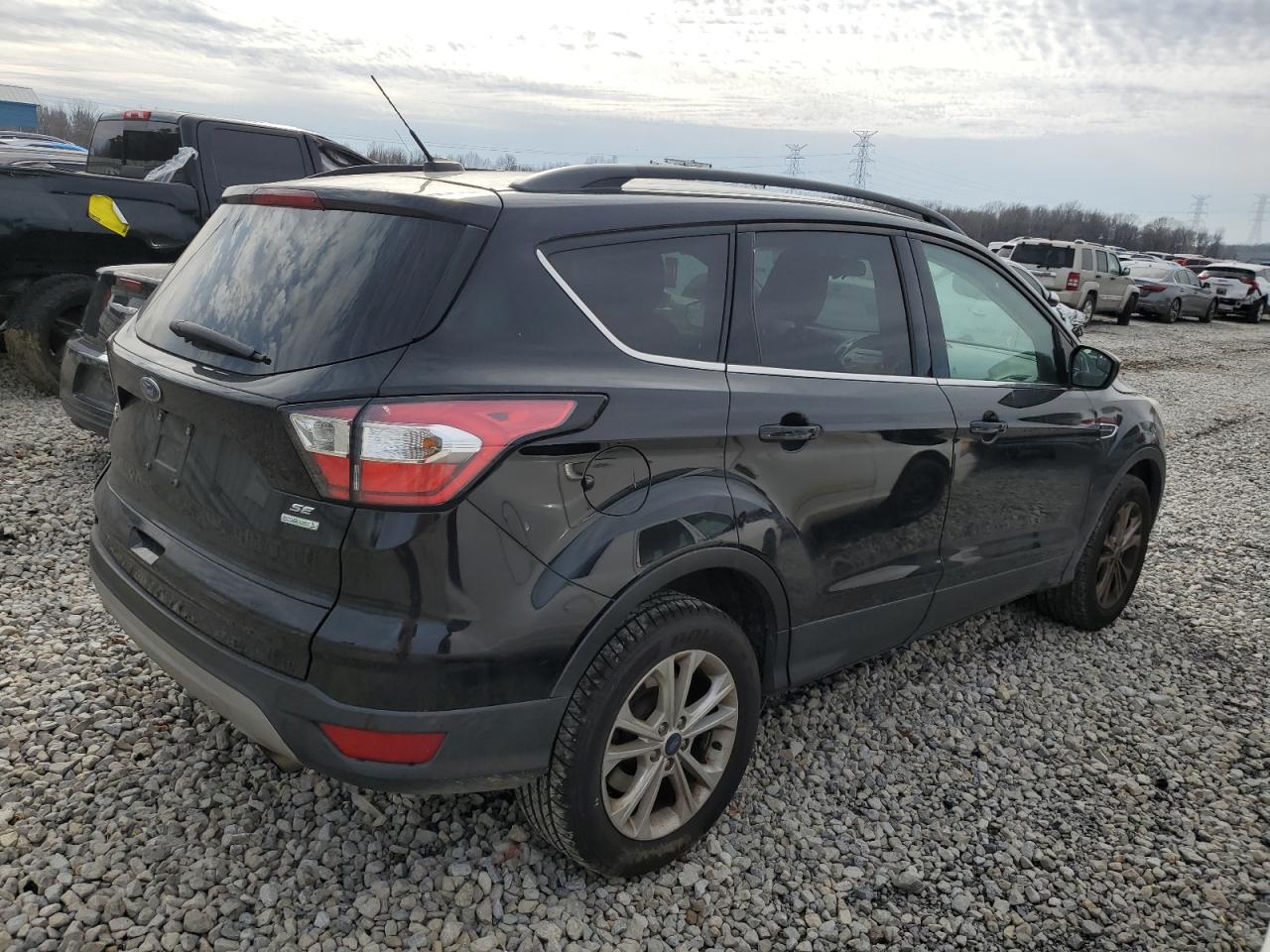 2018 Ford Escape VIN 1FMCU0GD3JUB41547 Copart auction photo, side / rear end damage thumbnail 3