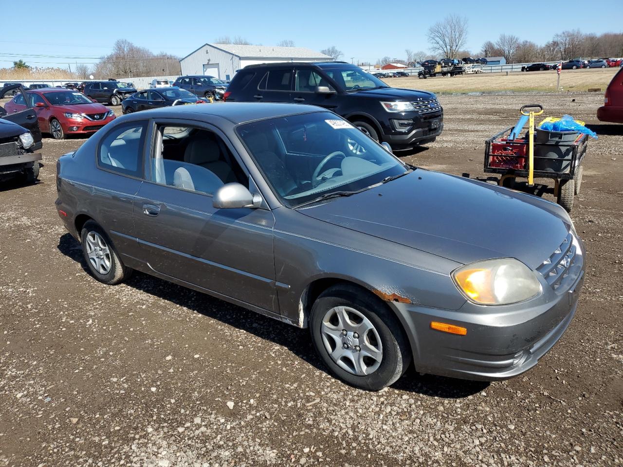 2005 Hyundai Accent VIN KMHCG35C65U331867 Copart auction photo, normal wear damage thumbnail 4