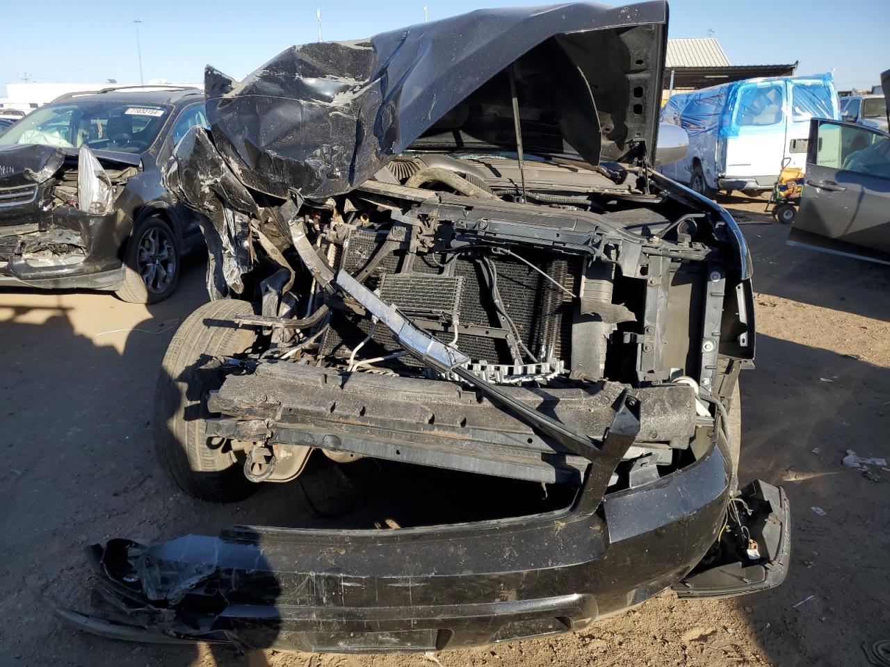 2009 Chevrolet Tahoe VIN 1GNFK33289R129834 Copart auction photo, front end / side damage thumbnail 5