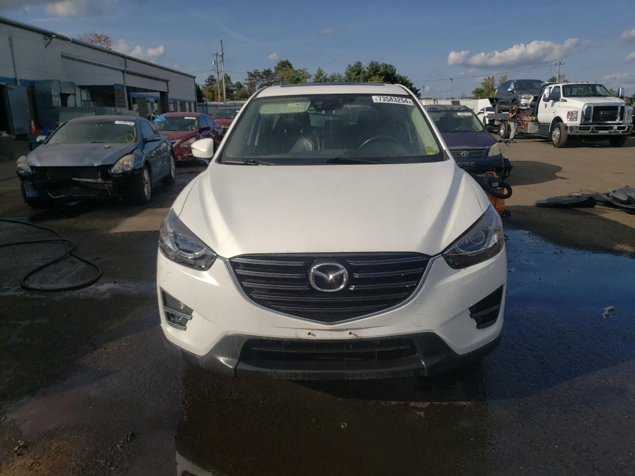 2016 Mazda CX-5 VIN JM3KE4DY6G0692316 Copart auction photo, rear end damage thumbnail 5