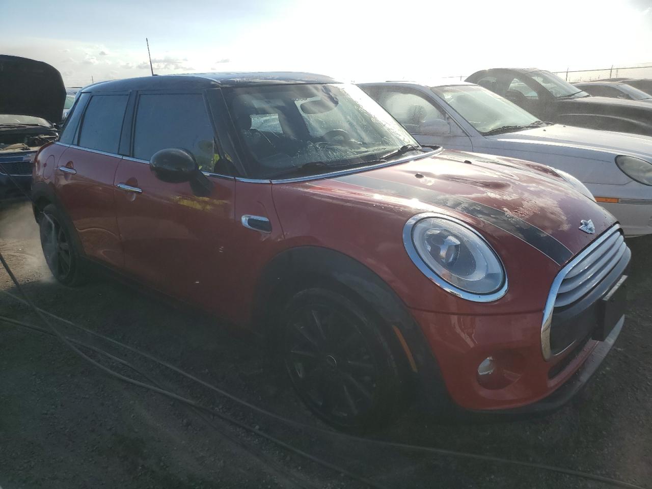 2015 MINI Cooper VIN WMWXS5C50FT830303 Copart auction photo, water/flood damage thumbnail 4