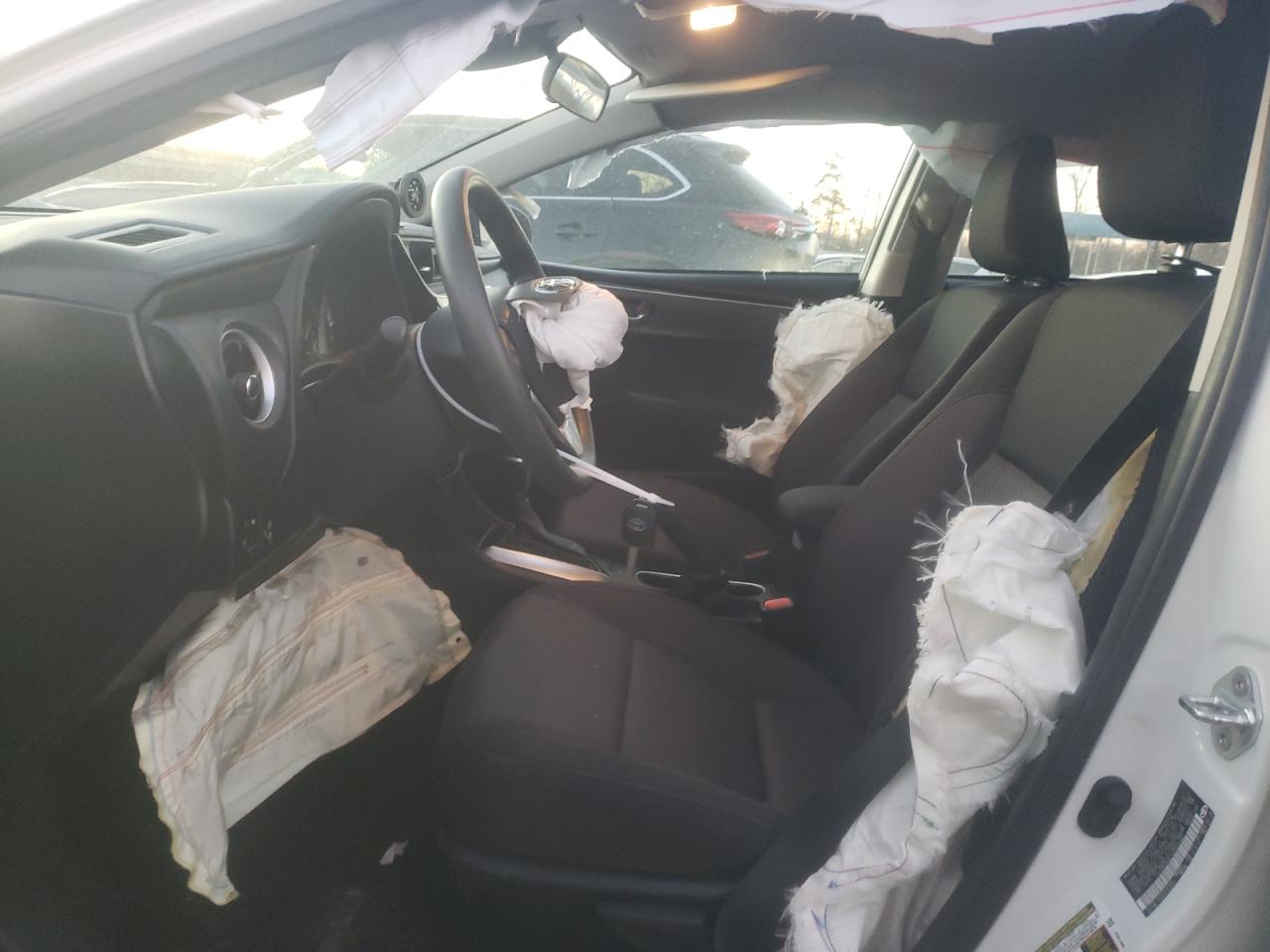 2018 Toyota Corolla VIN 5YFBURHE1JP852107 Copart auction photo, front end / side damage thumbnail 7