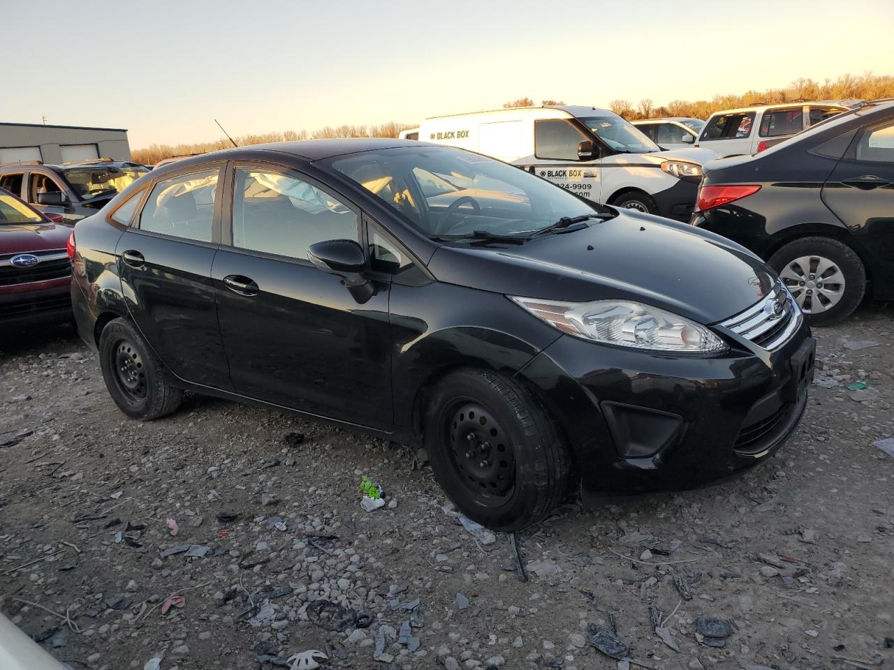 2013 Ford Fiesta VIN 3FADP4BJ5DM184290 Copart auction photo, side / front end damage thumbnail 4