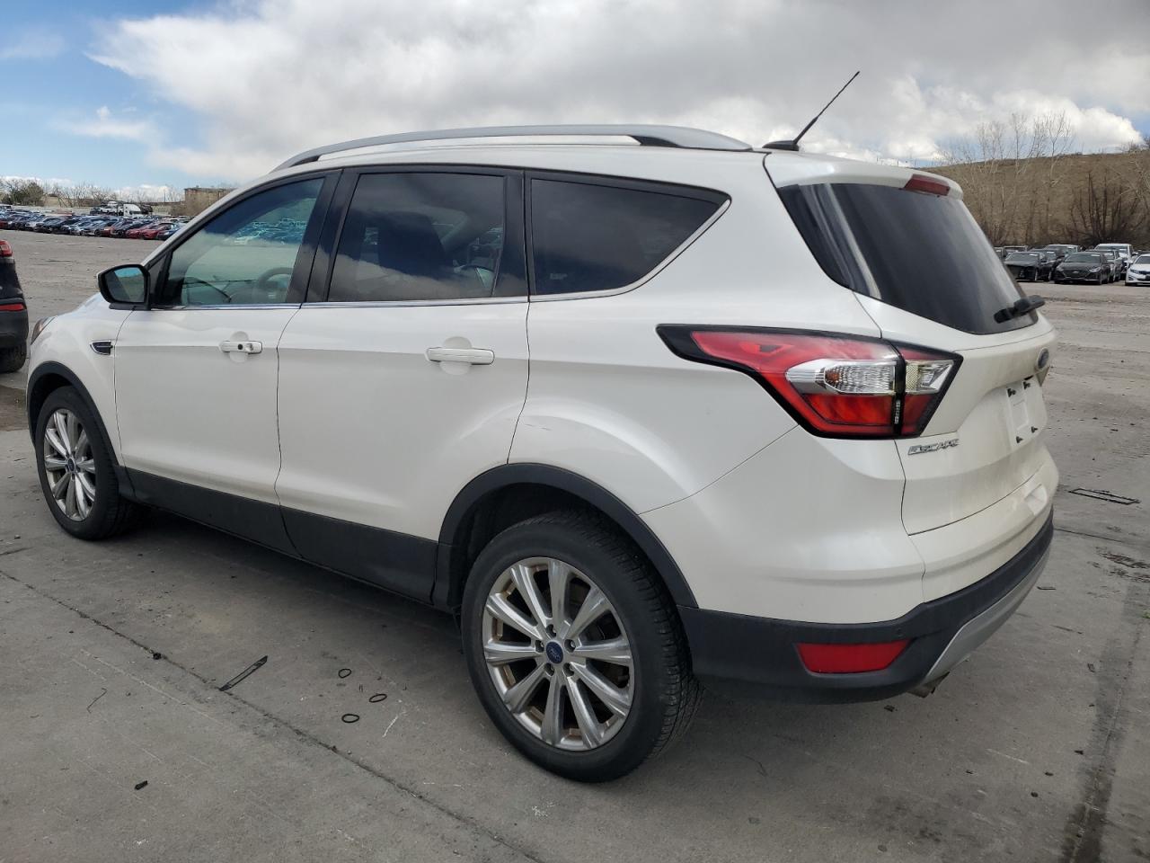 2017 Ford Escape VIN 1FMCU9JD4HUC94820 Copart auction photo, side / hail damage thumbnail 2