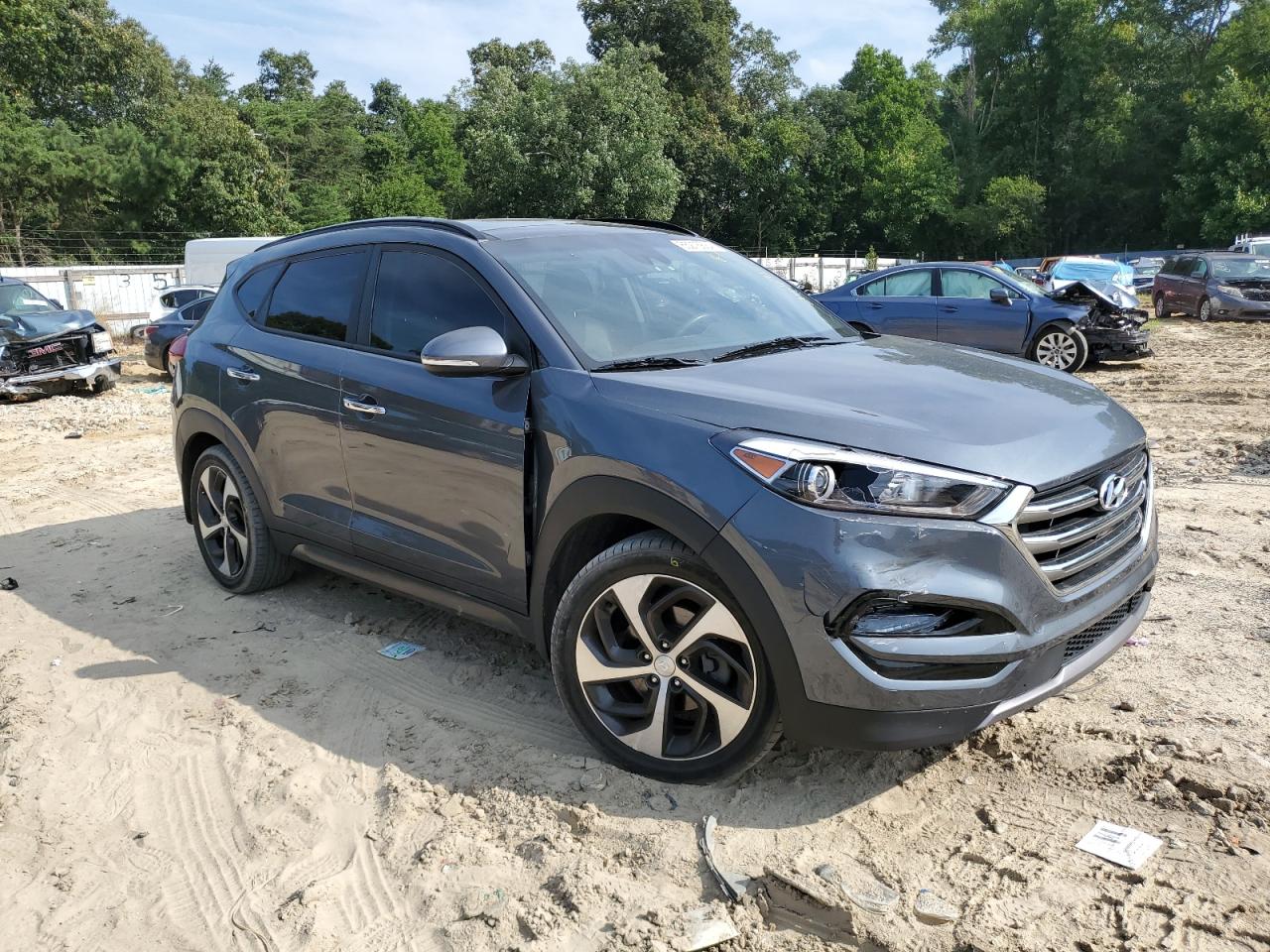 2016 Hyundai Tucson VIN KM8J33A23GU203850 Copart auction photo, front end / all over damage thumbnail 4