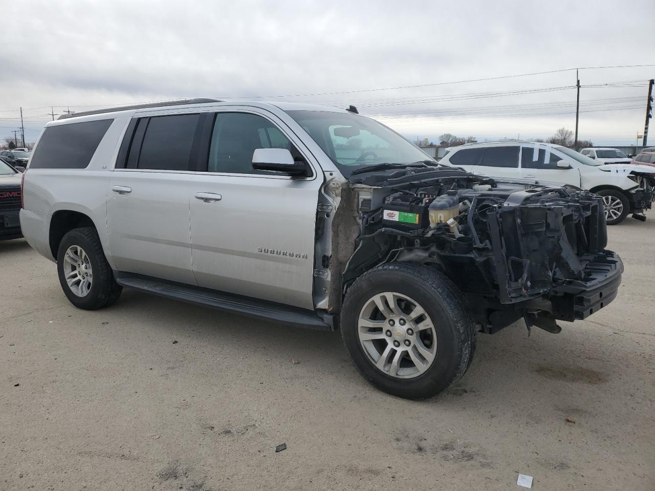 2015 Chevrolet Suburban VIN 1GNSKHEC5FR285455 Copart auction photo, front end / mechanical damage thumbnail 4