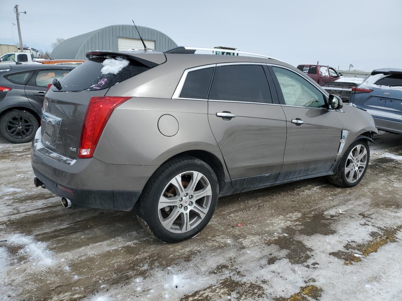 2012 Cadillac SRX VIN 3GYFNFE30CS528551 Copart auction photo, front end damage thumbnail 3