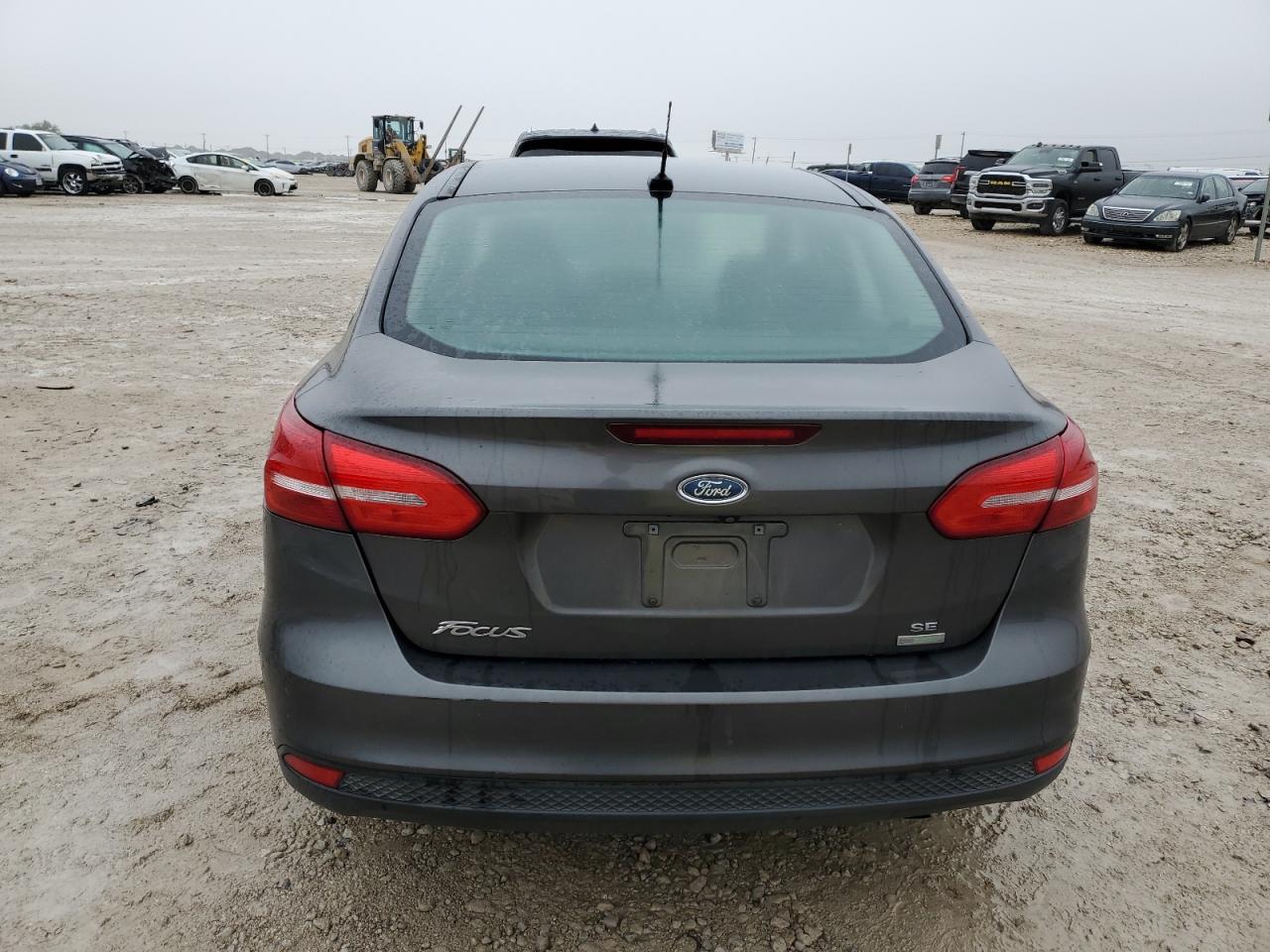2017 Ford Focus VIN 1FADP3FE7HL290156 Copart auction photo, side / front end damage thumbnail 6
