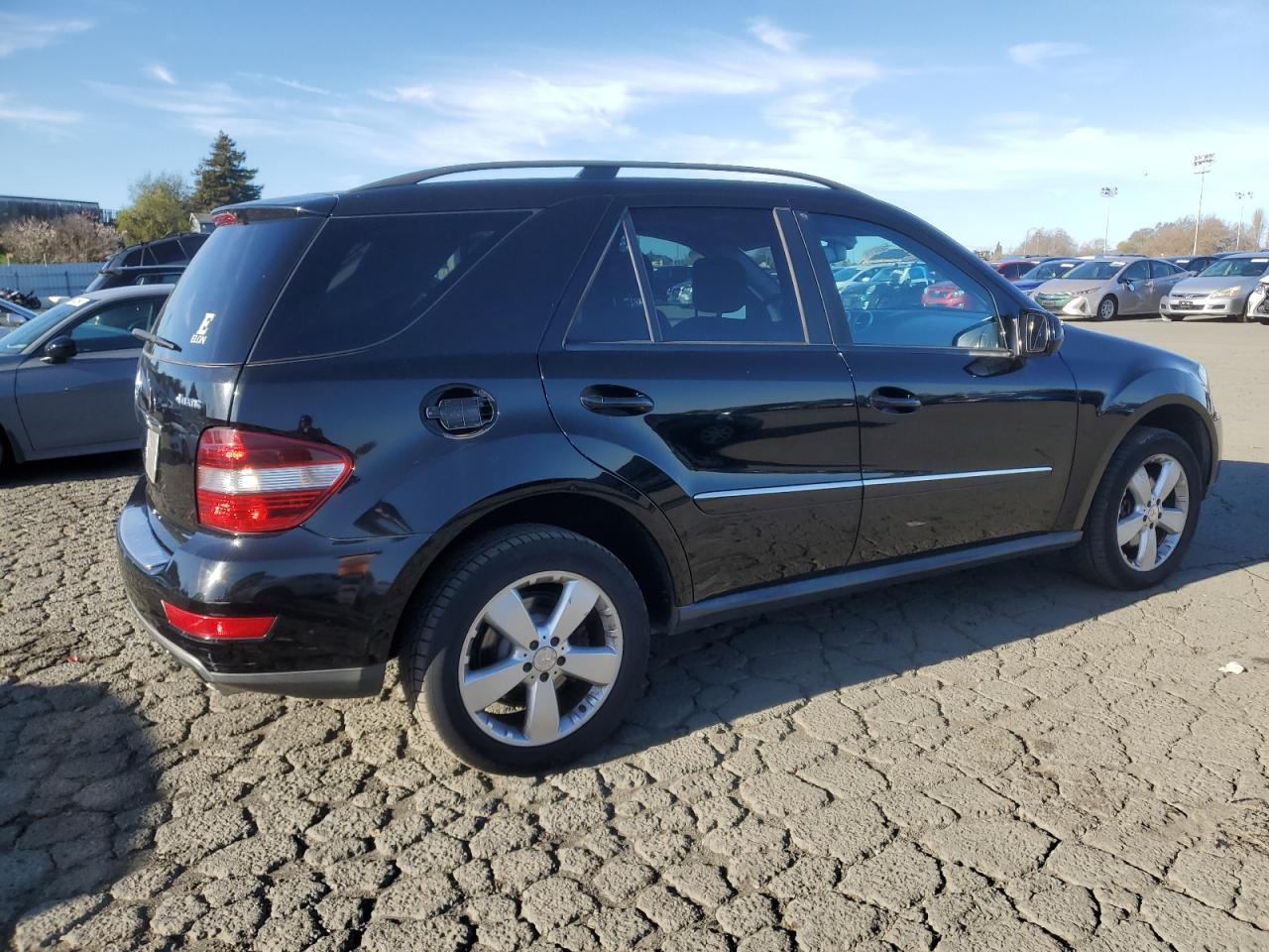 2009 Mercedes-Benz M-klasse VIN 4JGBB86E09A464414 Copart auction photo, minor dent/scratches damage thumbnail 3