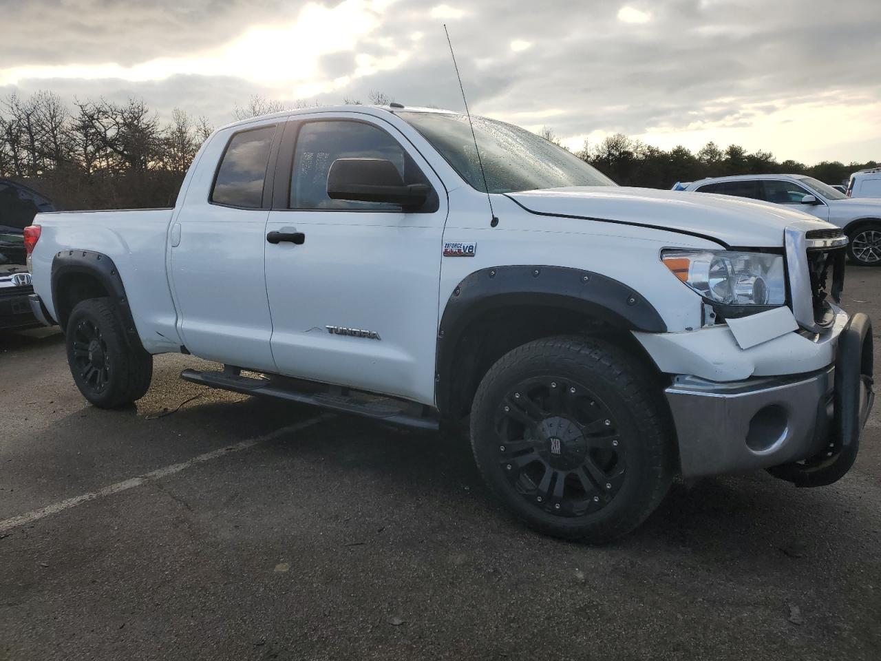 2012 Toyota Tundra VIN 5TFUY5F18CX244806 Copart auction photo, front end / minor dent/scratches damage thumbnail 4