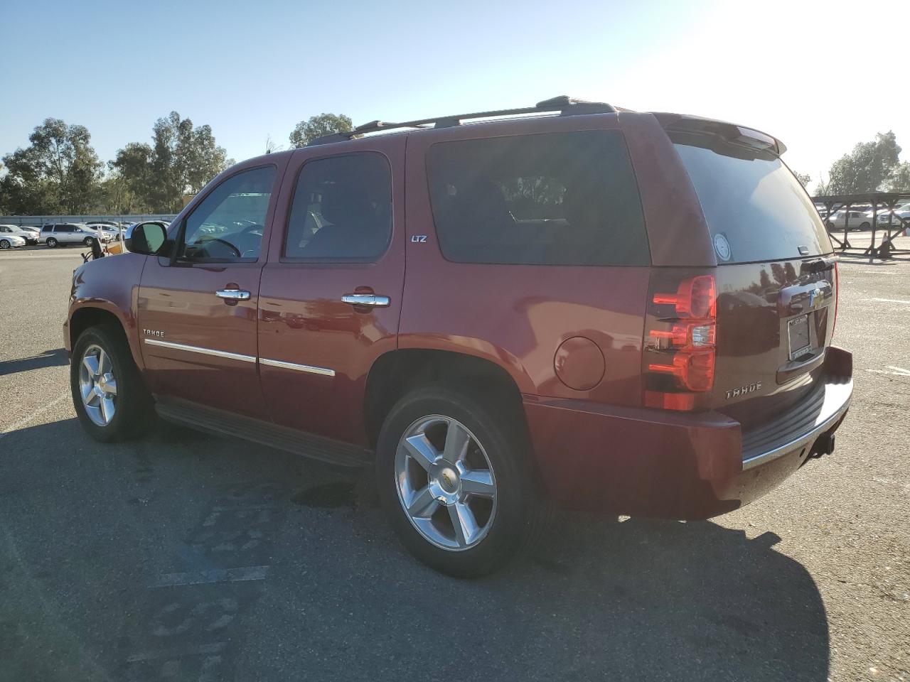 2011 Chevrolet Tahoe VIN 1GNSCCE03BR194409 Copart auction photo, front end / side damage thumbnail 2