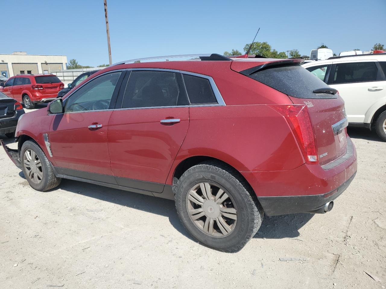 2011 Cadillac SRX VIN 3GYFNAEY9BS565997 Copart auction photo, front end / minor dent/scratches damage thumbnail 2
