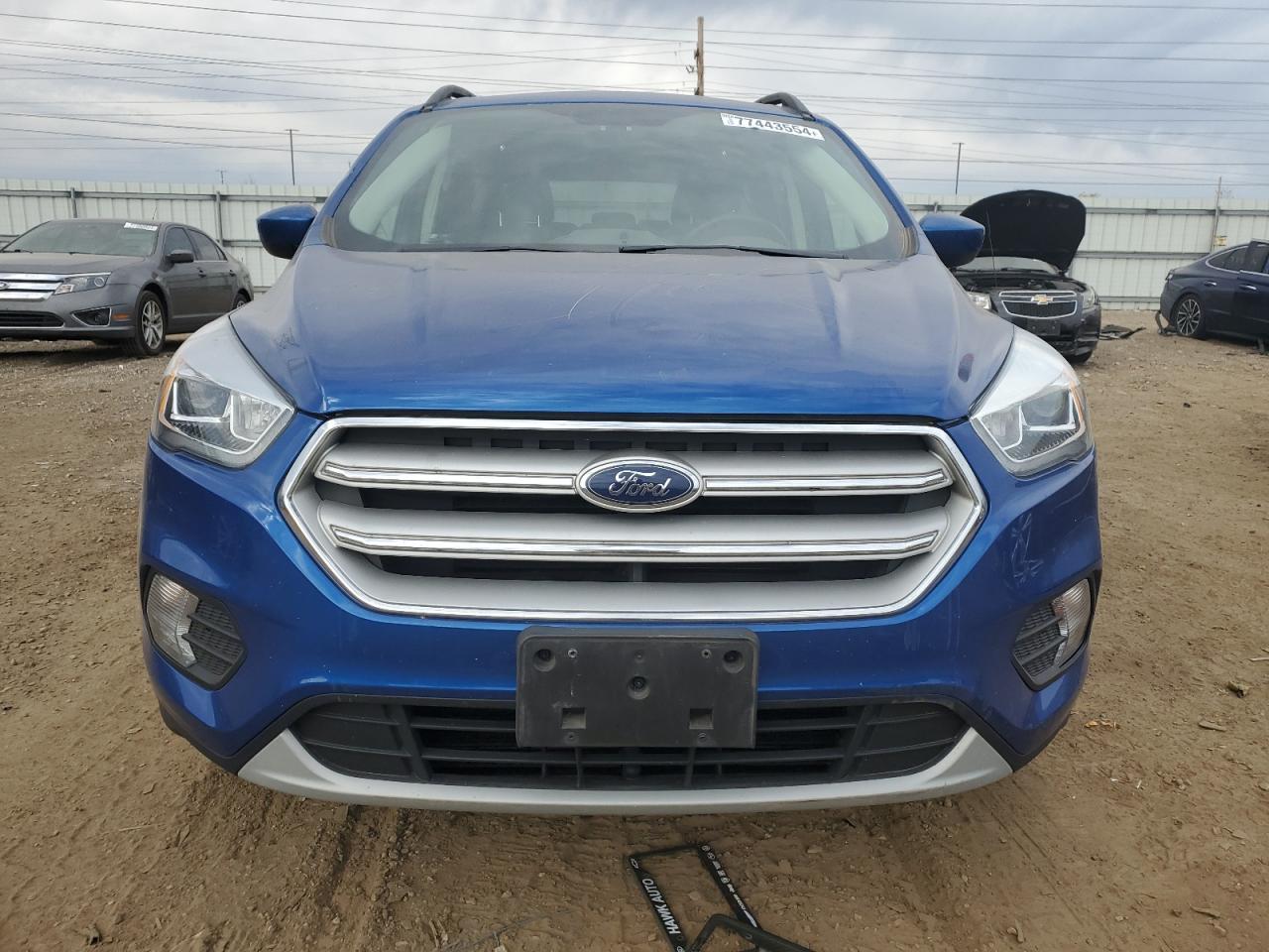 2019 Ford Escape VIN 1FMCU9HD3KUB97492 Copart auction photo, side / minor dent/scratches damage thumbnail 5