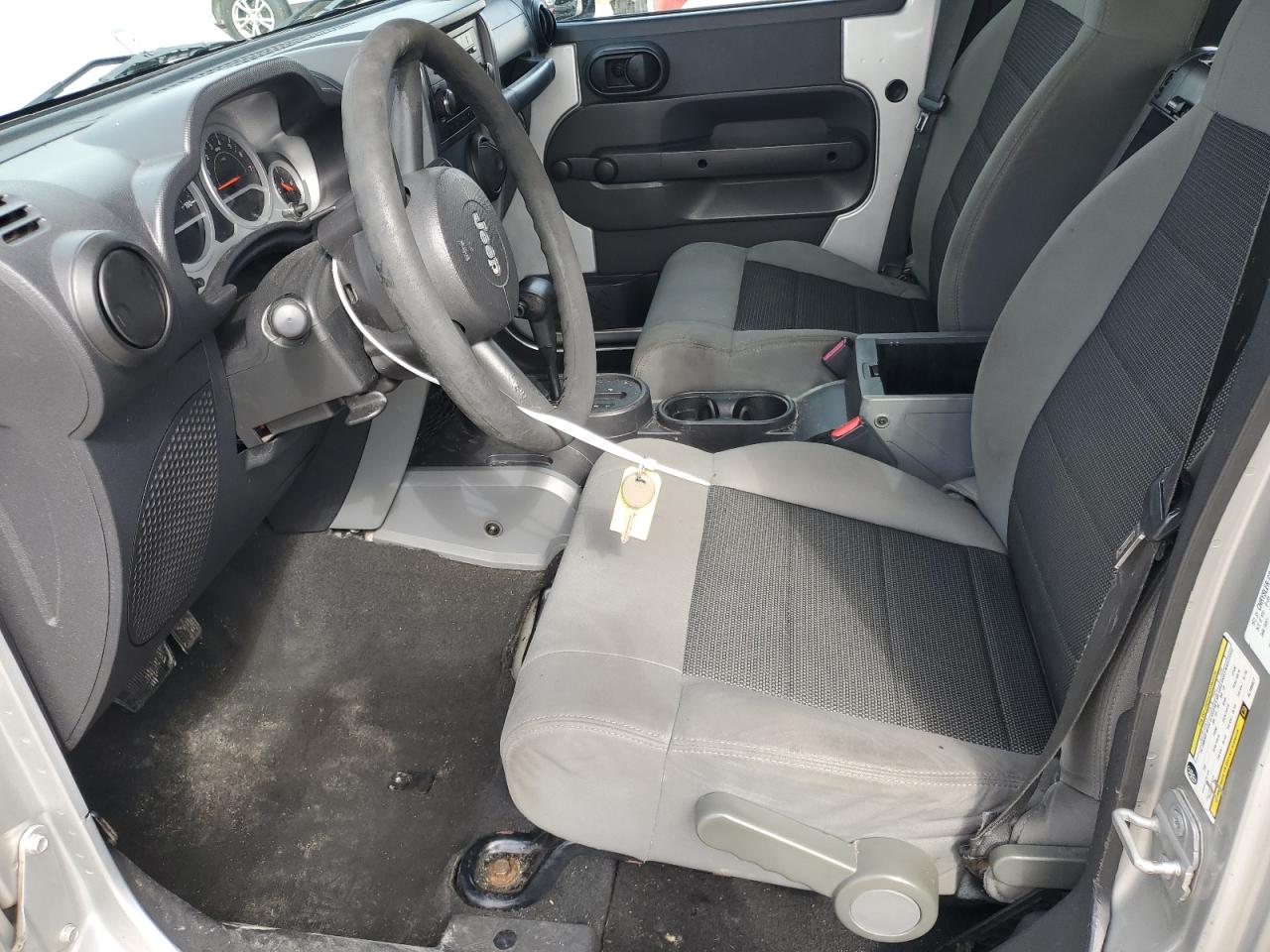 2010 Jeep Wrangler VIN 1J4BB3H15AL106827 Copart auction photo, all over damage thumbnail 7