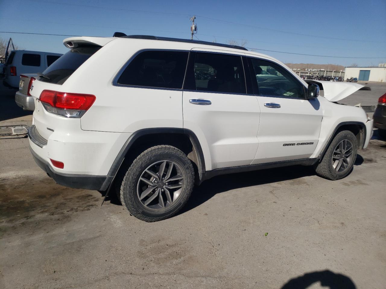 2019 Jeep Grand Cherokee VIN 1C4RJFBG0KC610631 Copart auction photo, front end damage thumbnail 3