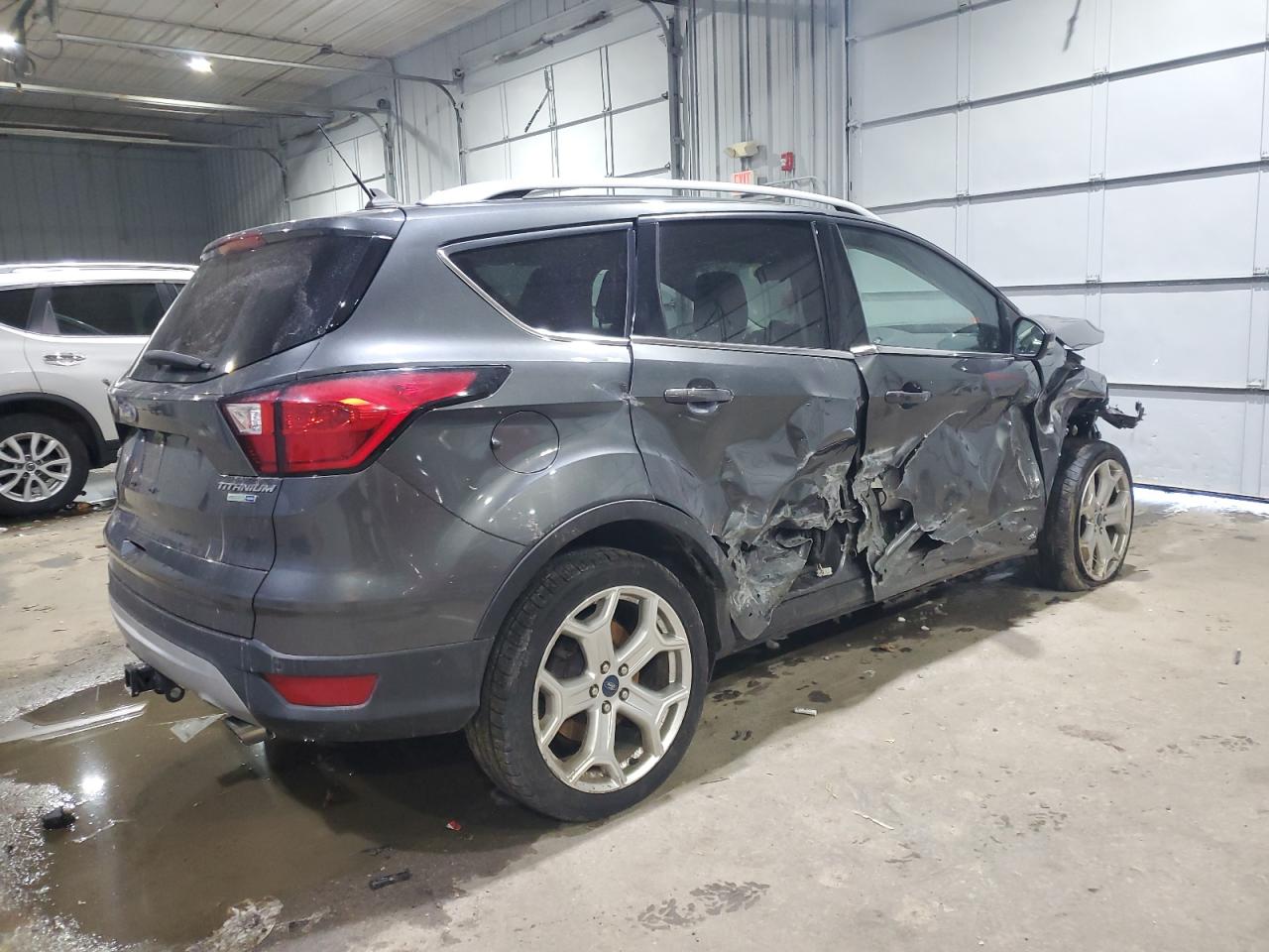 2019 Ford Escape VIN 1FMCU9J99KUB22723 Copart auction photo, side / front end damage thumbnail 3