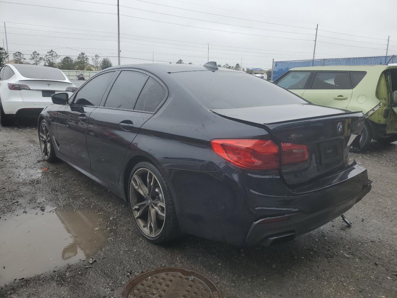 2019 BMW M5 VIN WBAJB9C55KB464058 Copart auction photo, rear end damage thumbnail 2