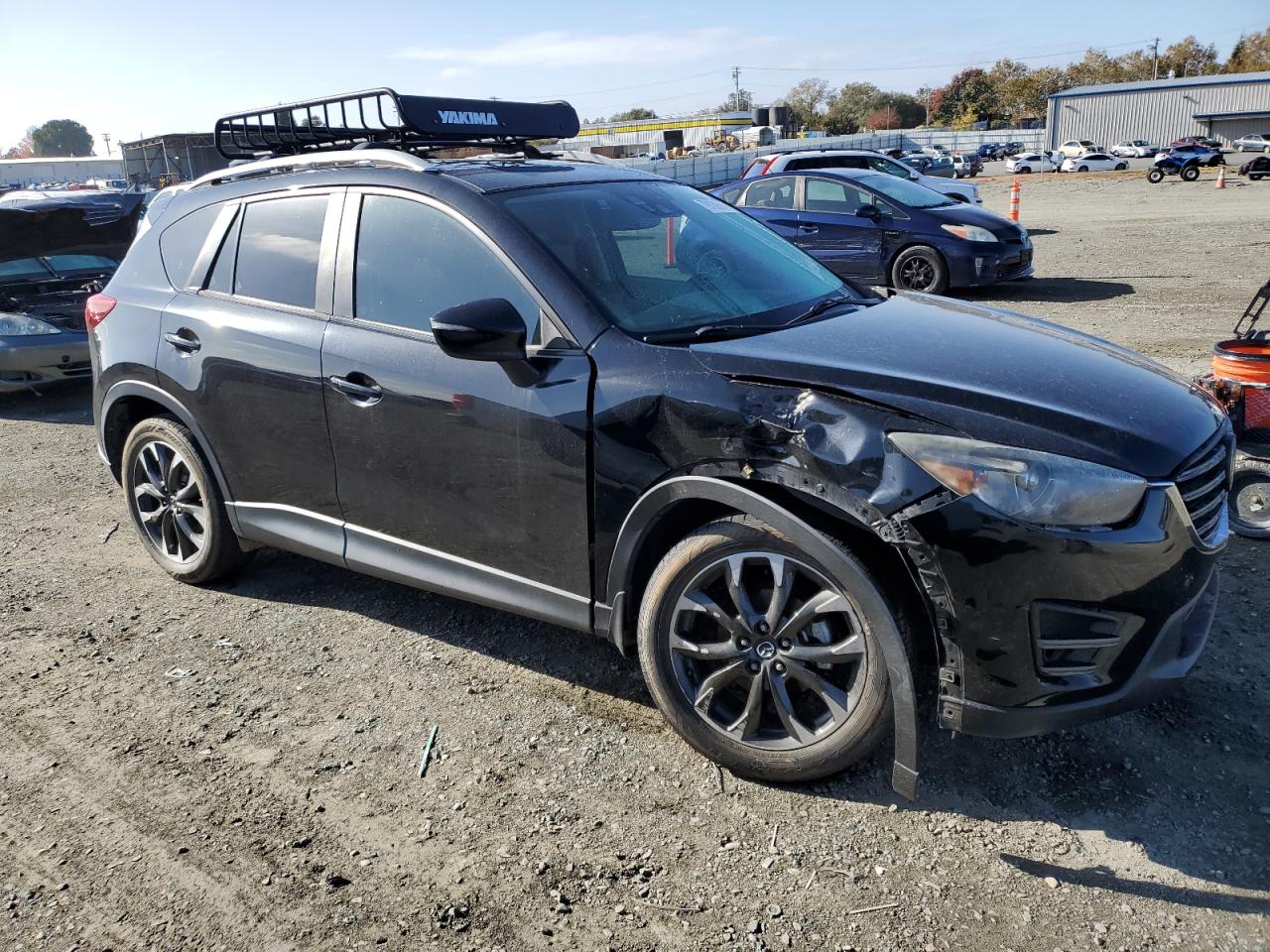 2016 Mazda CX-5 VIN JM3KE4DY4G0725667 Copart auction photo, side / front end damage thumbnail 4