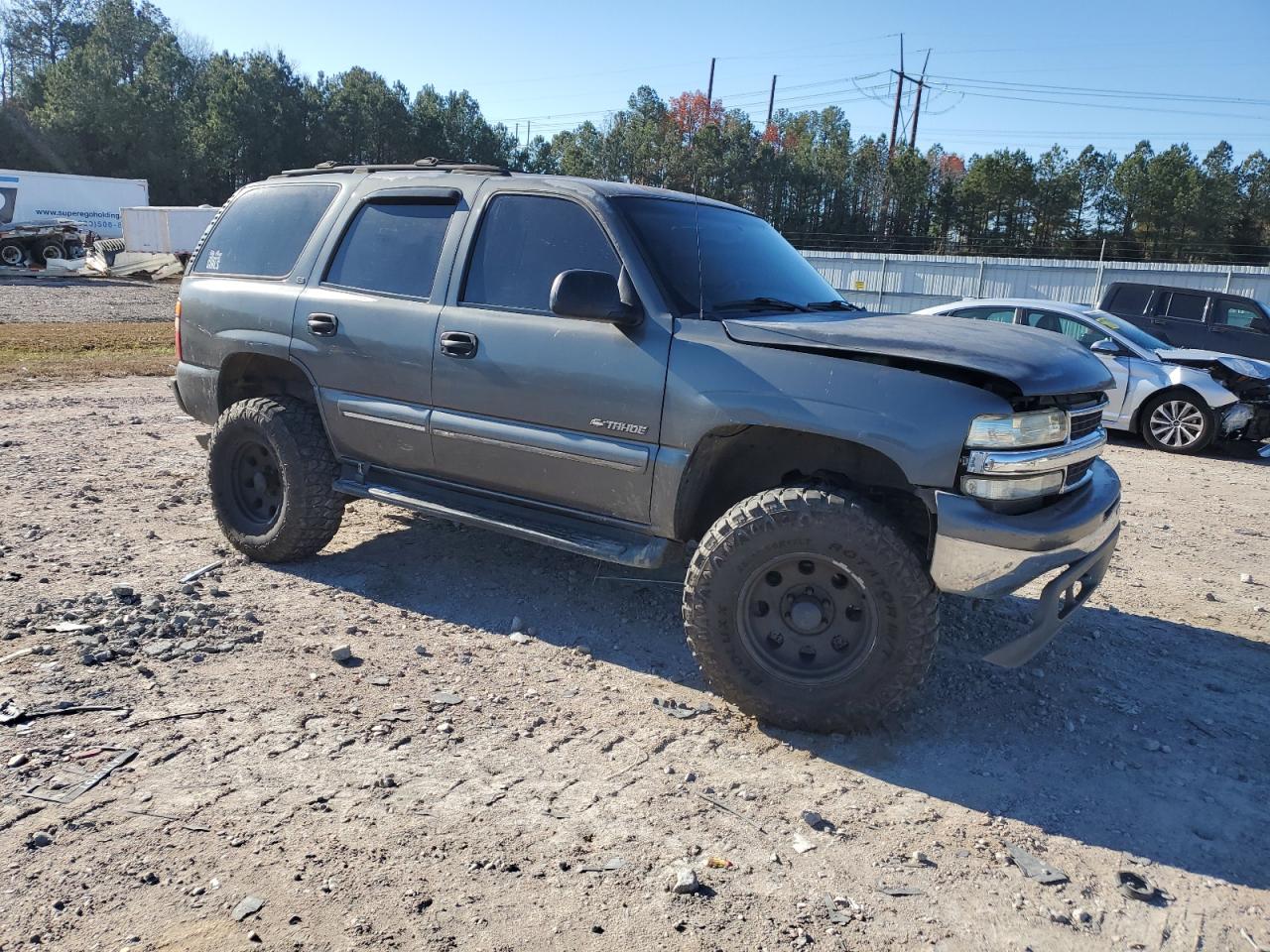 2000 Chevrolet Tahoe VIN 1GNEK13TXYJ118999 Copart auction photo, front end / undercarriage damage thumbnail 4