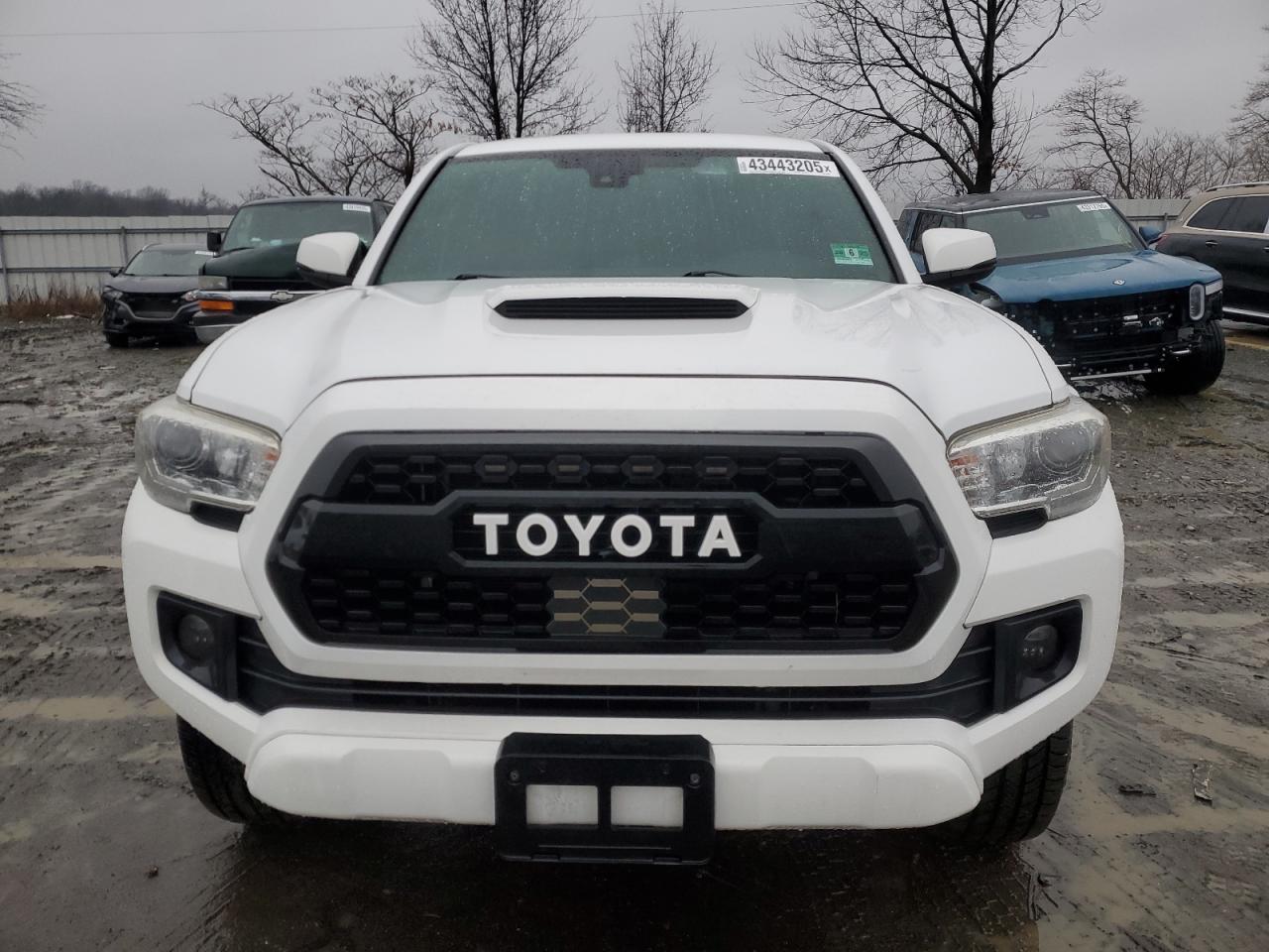 2018 Toyota Tacoma VIN 3TMDZ5BN4JM039542 Copart auction photo, rear end damage thumbnail 5