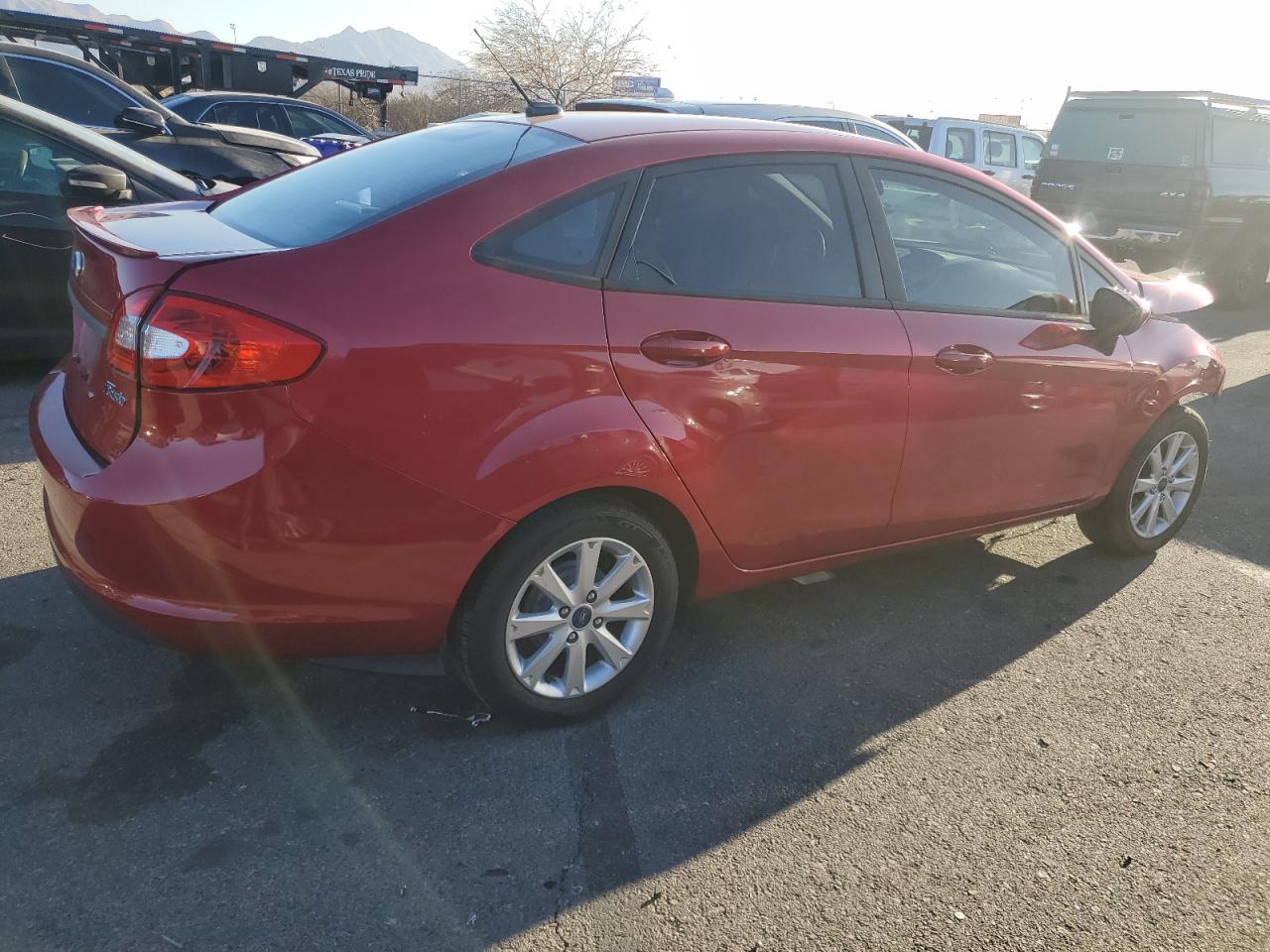 2011 Ford Fiesta VIN 3FADP4BJ0BM223915 Copart auction photo, front end damage thumbnail 3