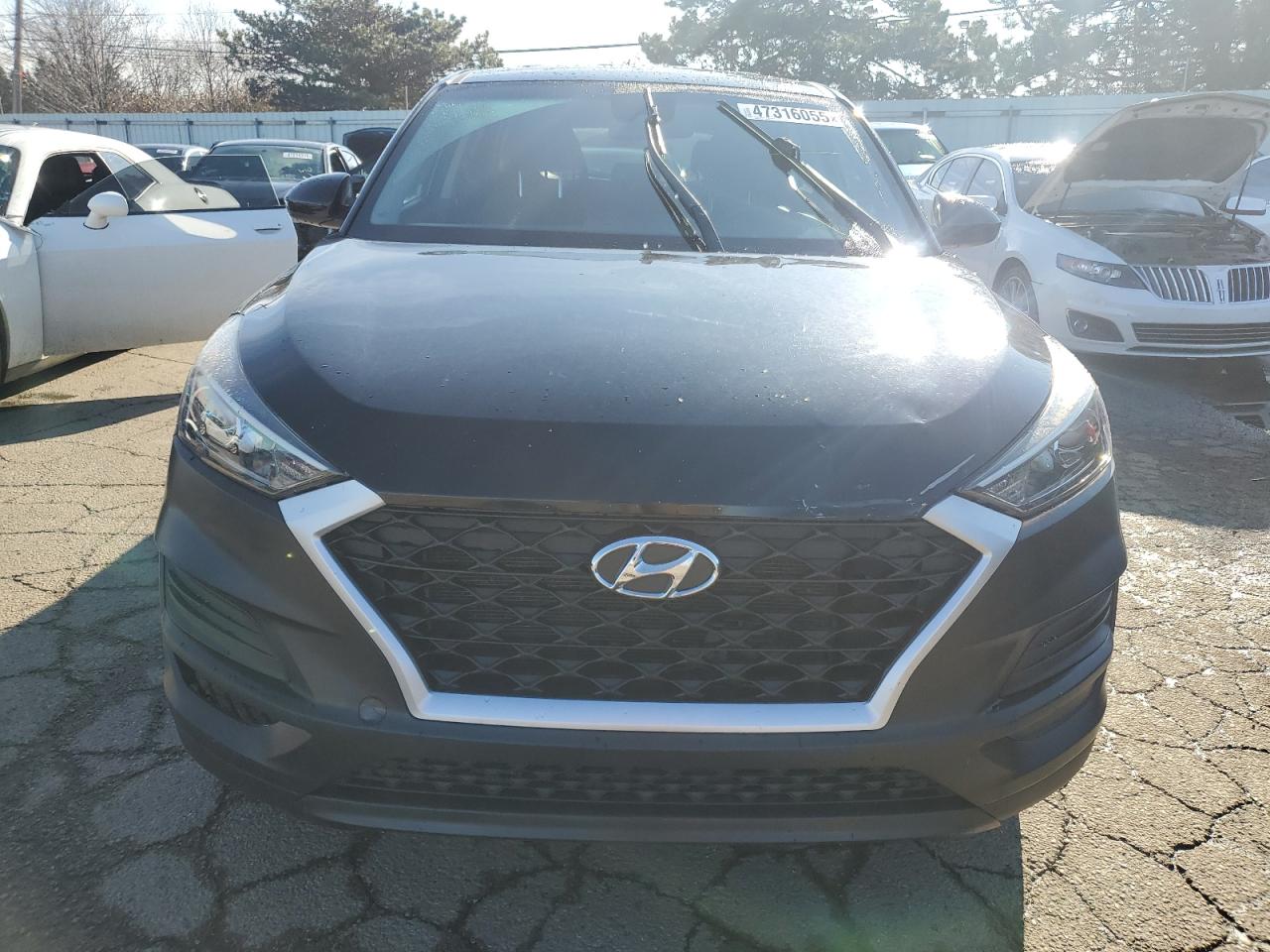 2019 Hyundai Tucson VIN KM8J2CA48KU867784 Copart auction photo, front end / rear end damage thumbnail 5