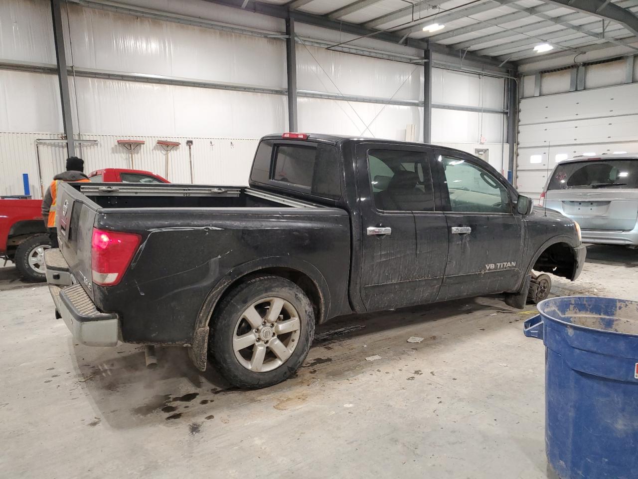 2010 Nissan Titan VIN 1N6BA0EC1AN320311 Copart auction photo, front end / undercarriage damage thumbnail 3