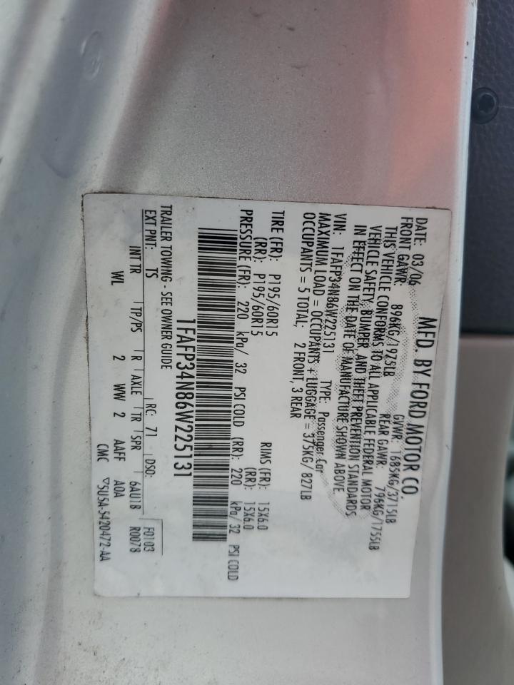2006 Ford Focus VIN 1FAFP34N86W225131 Copart auction photo, side / minor dent/scratches damage thumbnail 12