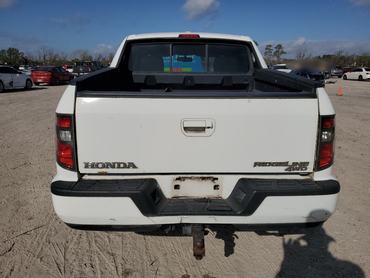 2013 Honda Ridgeline VIN 5FPYK1F53DB012325 Copart auction photo, front end / all over damage thumbnail 6