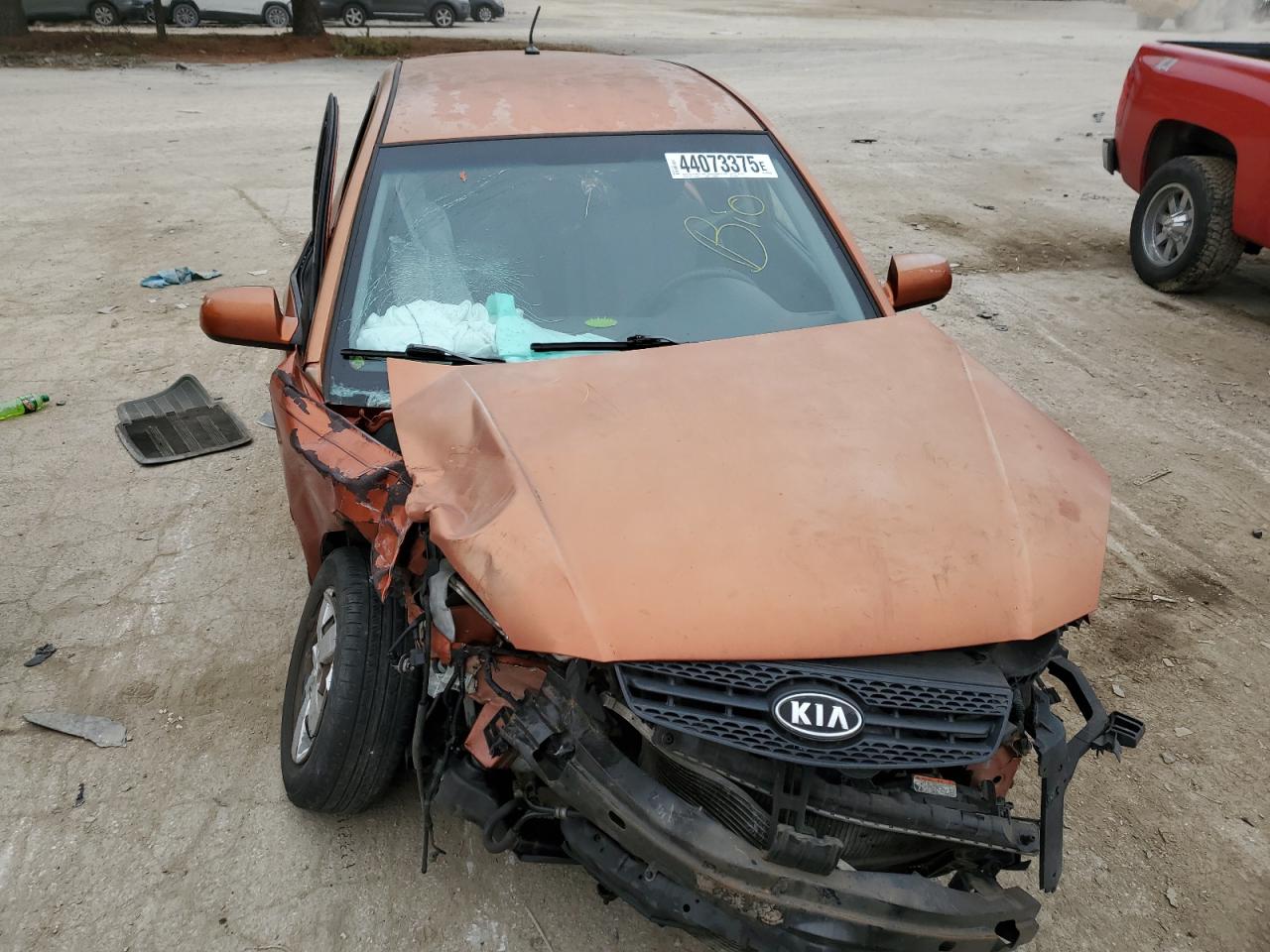 2009 KIA Rio VIN KNADE243196548504 Copart auction photo, all over damage thumbnail 5