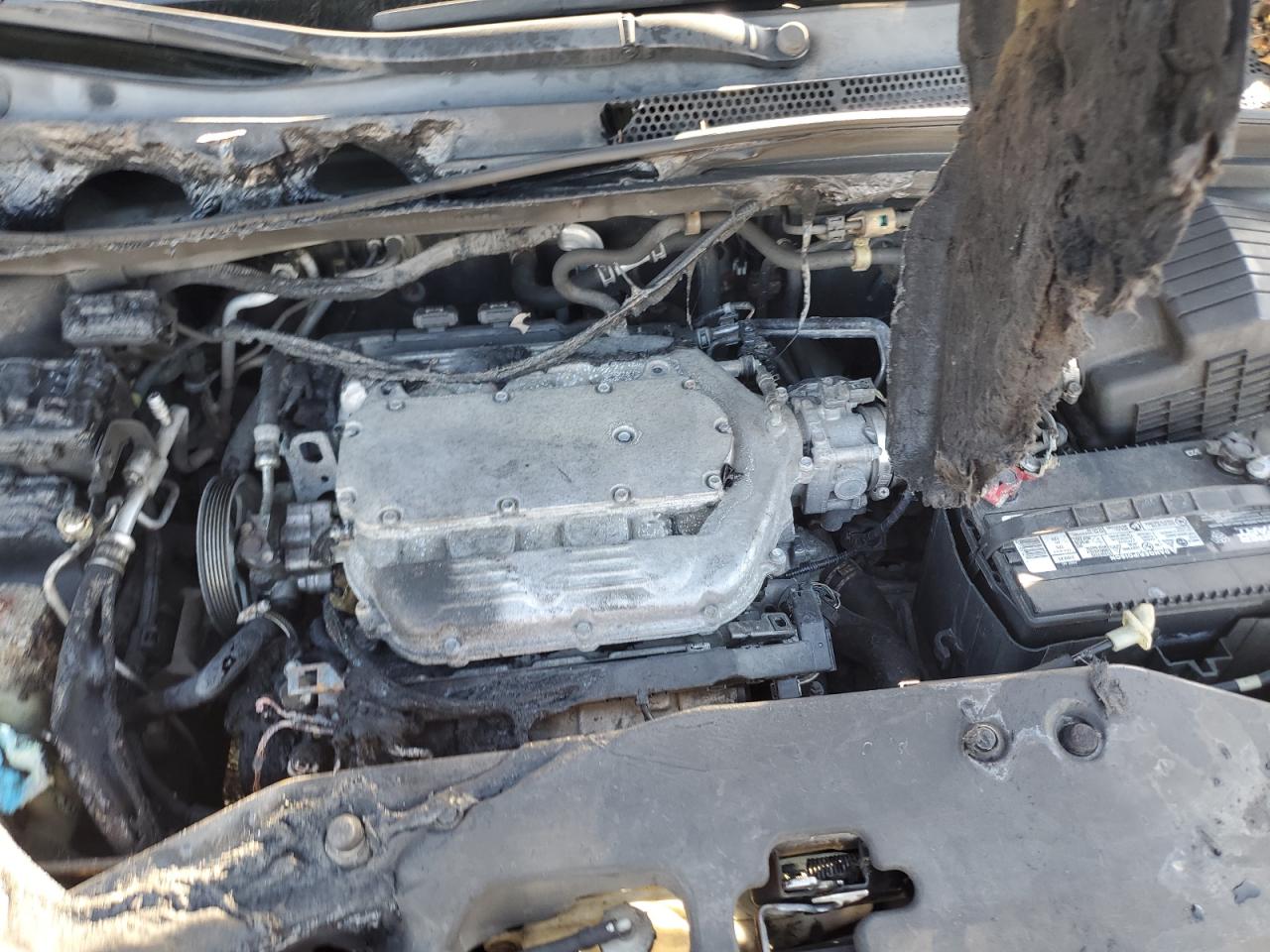 2009 Honda Odyssey VIN 5FNRL38929B055454 Copart auction photo, burn - engine damage thumbnail 12