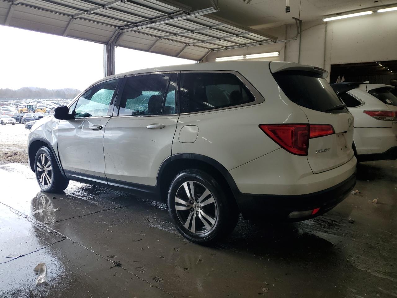 2016 Honda Pilot VIN 5FNYF5H52GB047119 Copart auction photo, all over damage thumbnail 2