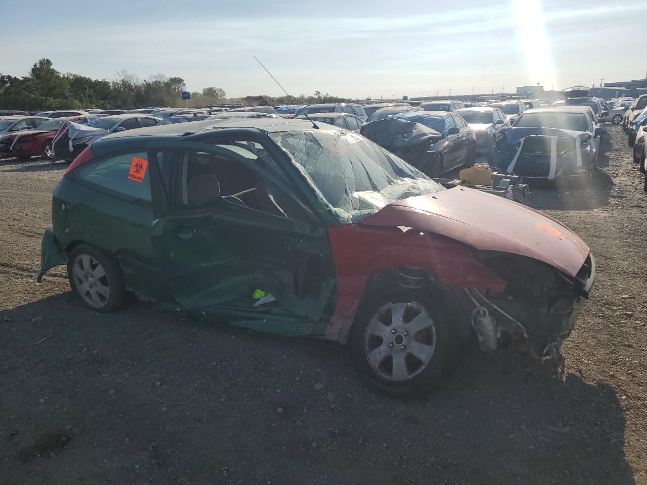 2002 Ford Focus VIN 3FAFP31302R143054 Copart auction photo, side / undercarriage damage thumbnail 4