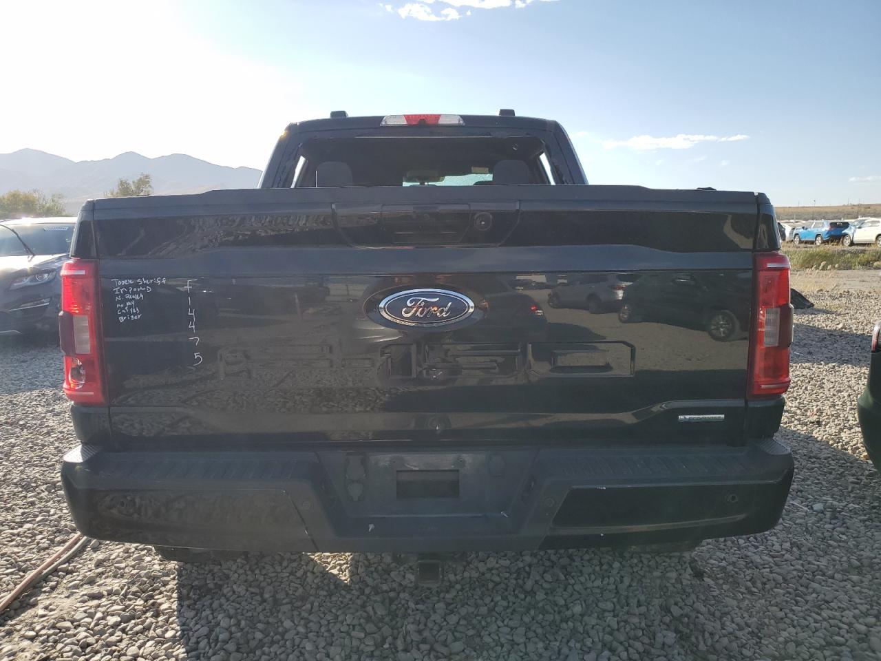 2021 Ford F-150 VIN 1FTFW1E88MKF14475 Copart auction photo, vandalism damage thumbnail 6