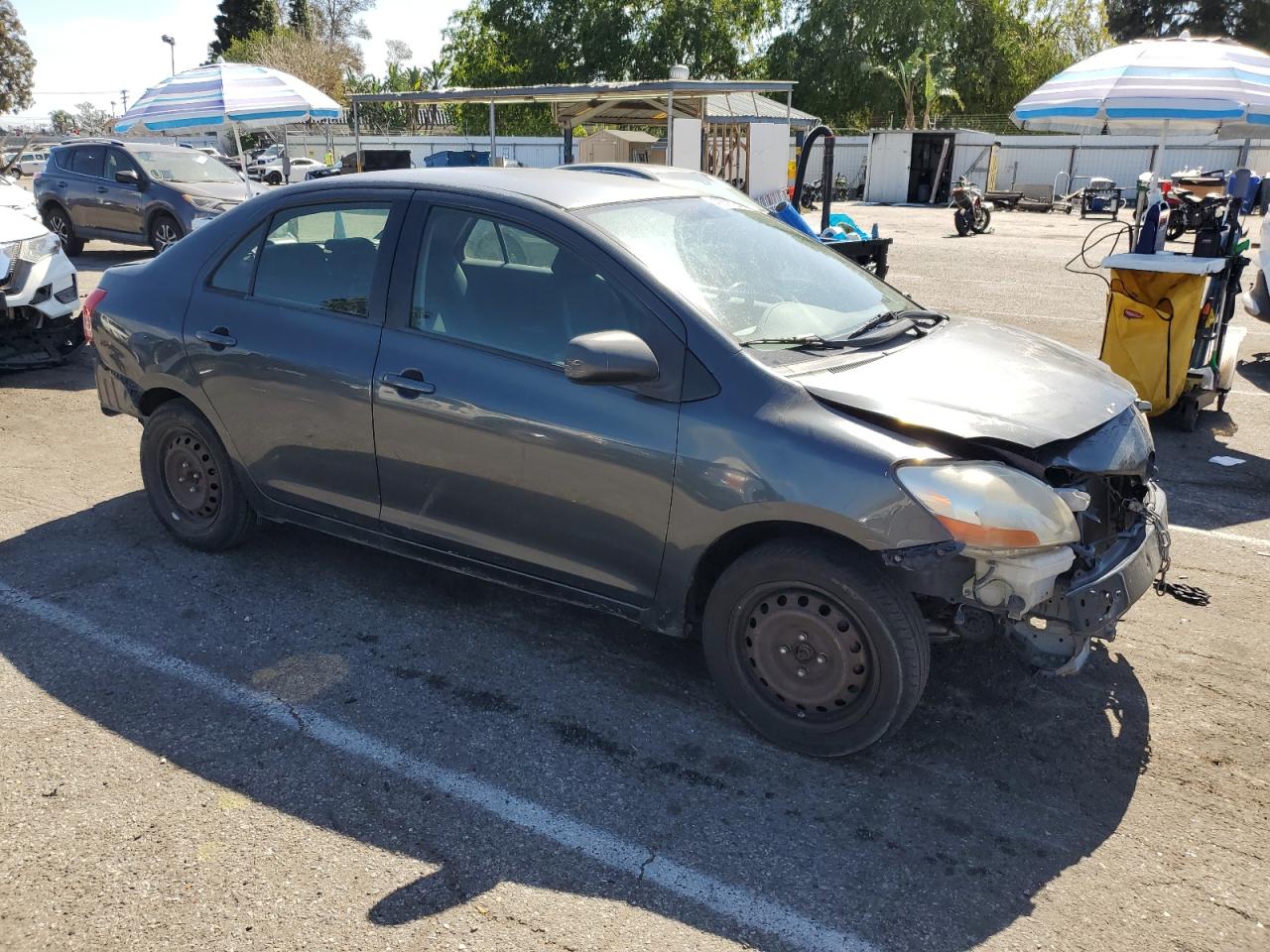 2009 Toyota Yaris VIN JTDBT903694051524 Copart auction photo, front end / rear end damage thumbnail 4