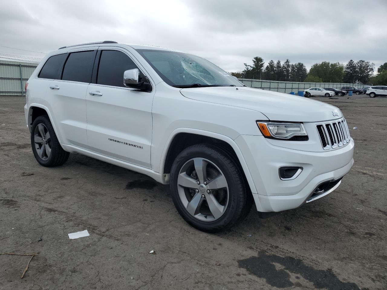 2015 Jeep Grand Cherokee VIN 1C4RJFCG5FC605090 Copart auction photo, top/roof damage thumbnail 4