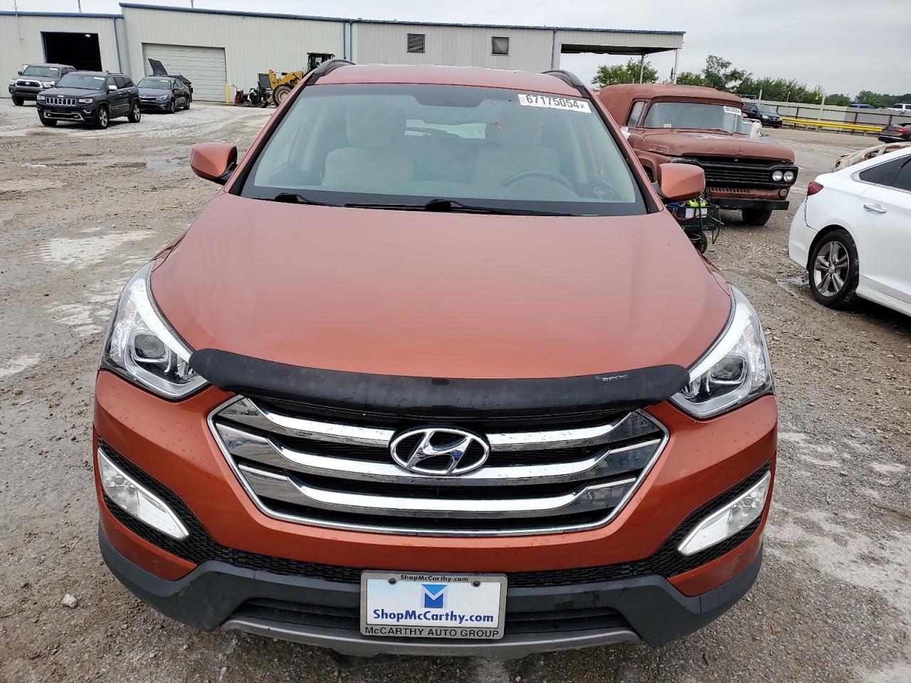 2014 Hyundai Santa Fe VIN 5XYZUDLB6EG219787 Copart auction photo, undercarriage / minor dent/scratches damage thumbnail 5
