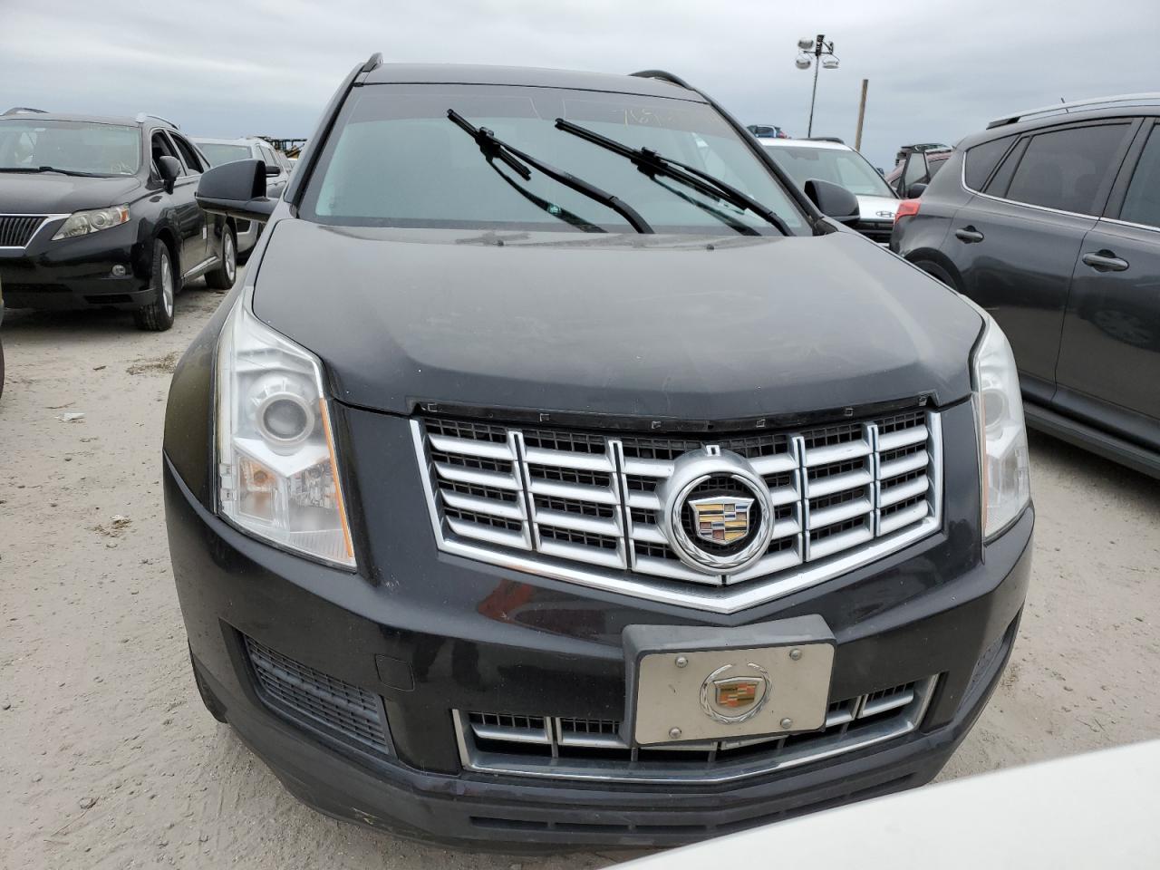 2016 Cadillac SRX VIN 3GYFNAE3XGS509630 Copart auction photo, front end damage thumbnail 5