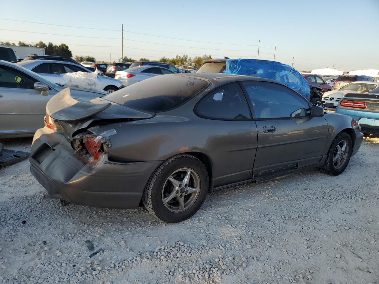 2000 Pontiac Grand Prix VIN 1G2WP12KXYF330042 Copart auction photo, rear end / side damage thumbnail 3