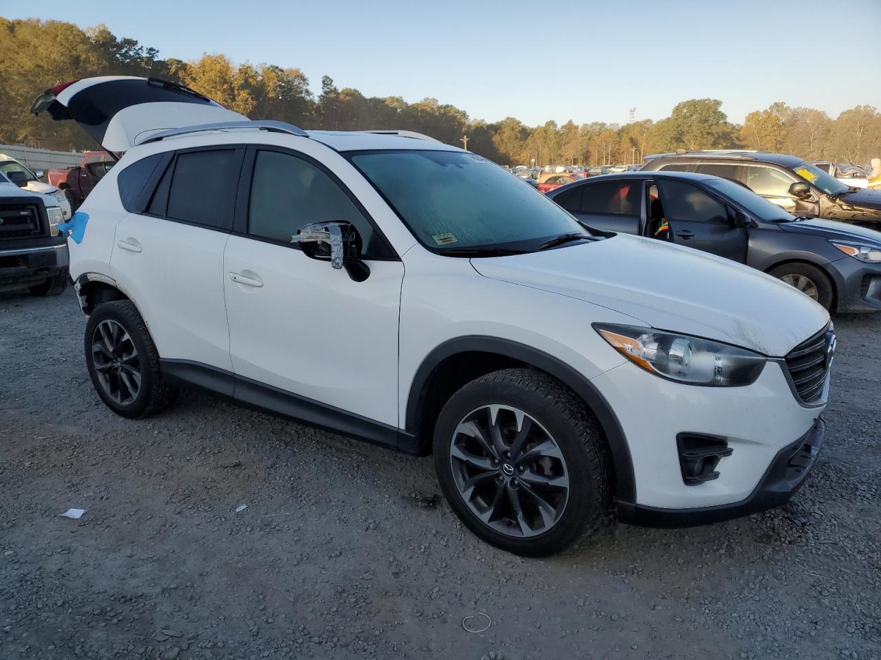 2016 Mazda CX-5 VIN JM3KE4DY1G0815276 Copart auction photo, rear end damage thumbnail 4