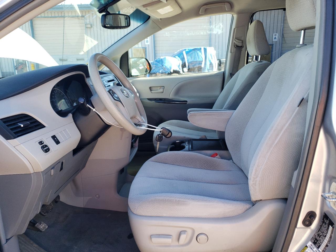 2014 Toyota Sienna VIN 5TDKK3DC6ES469428 Copart auction photo, side / front end damage thumbnail 7