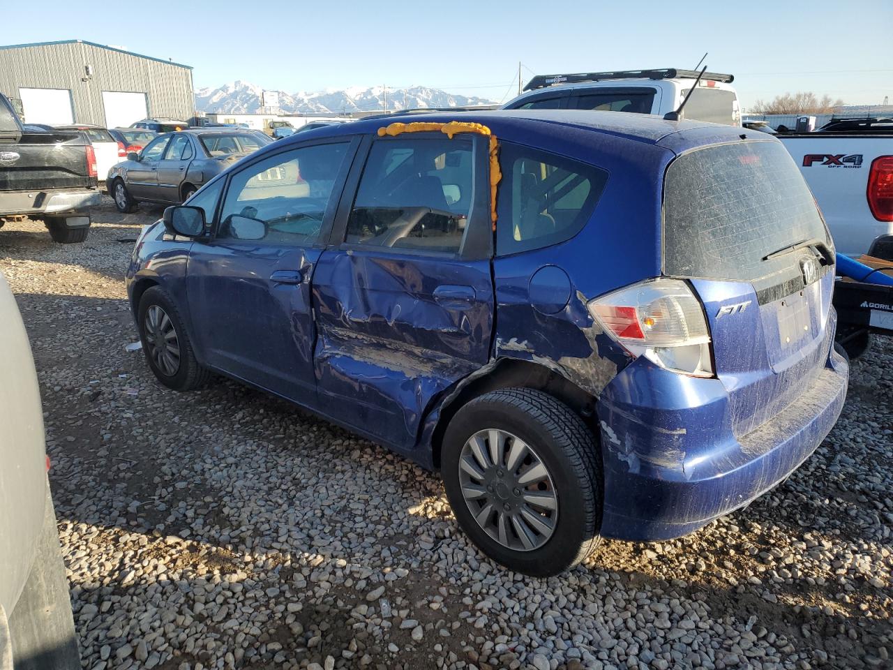 2009 Honda Fit VIN JHMGE88249S029179 Copart auction photo, side damage thumbnail 2