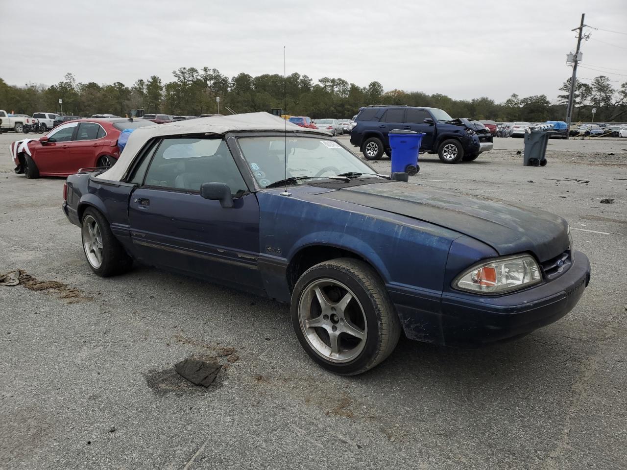 1993 Ford Mustang VIN 1FACP44E4PF198262 Copart auction photo, rear end / side damage thumbnail 4