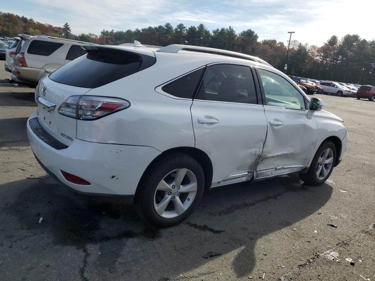 2010 Lexus RX VIN 2T2BK1BA2AC039707 Copart auction photo, side / minor dent/scratches damage thumbnail 3