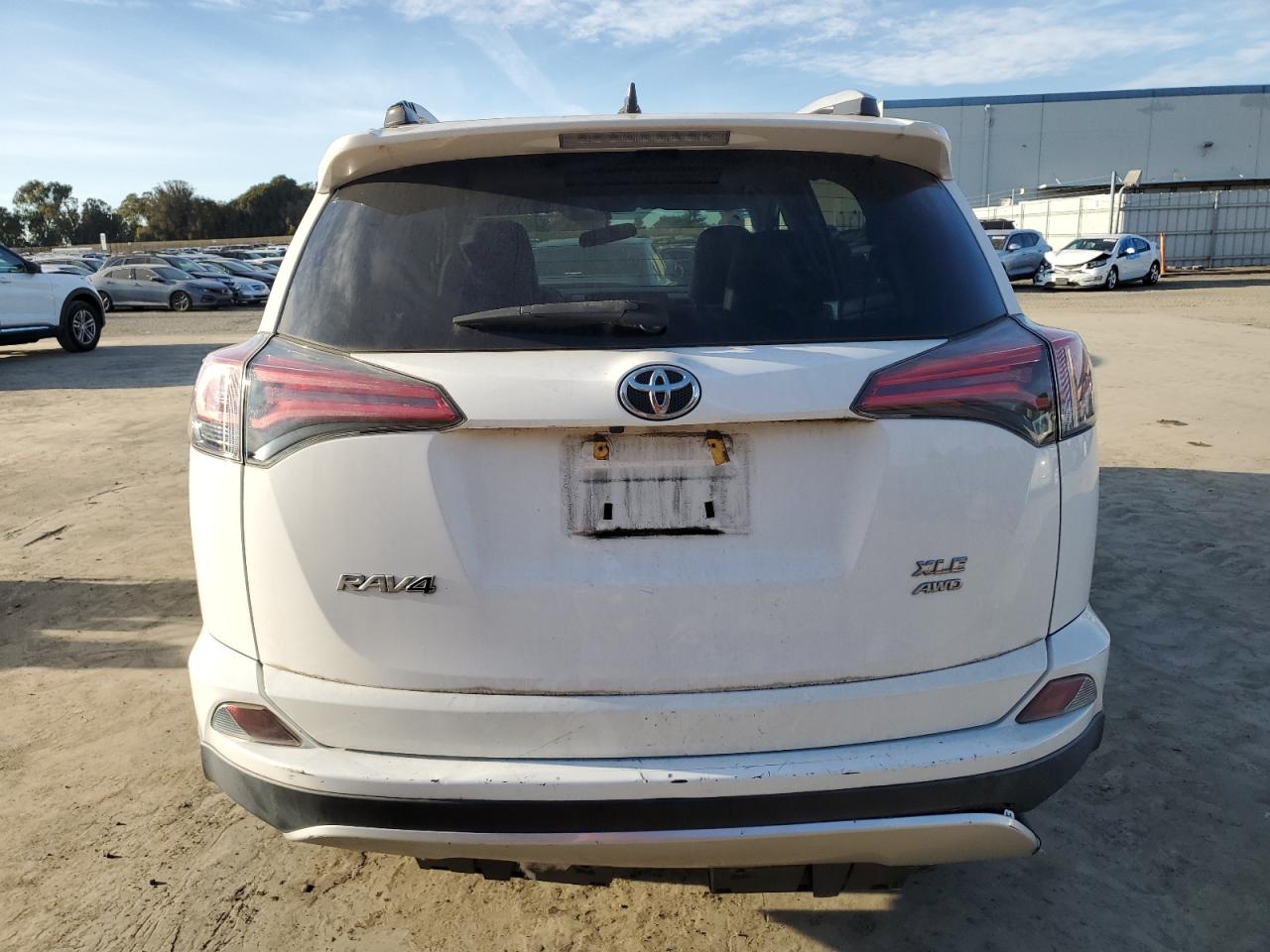 2016 Toyota RAV 4 VIN 2T3RFREVXGW414391 Copart auction photo, front end / undercarriage damage thumbnail 6