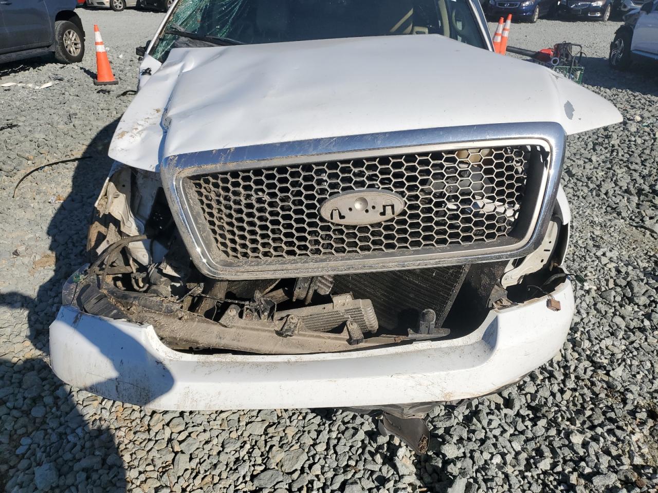 2005 Ford F-150 VIN 1FTPX12585NB79438 Copart auction photo, all over damage thumbnail 12